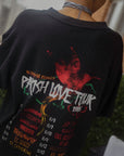 black parish love tour t-shirt back graphic with tour dates worn outdoors