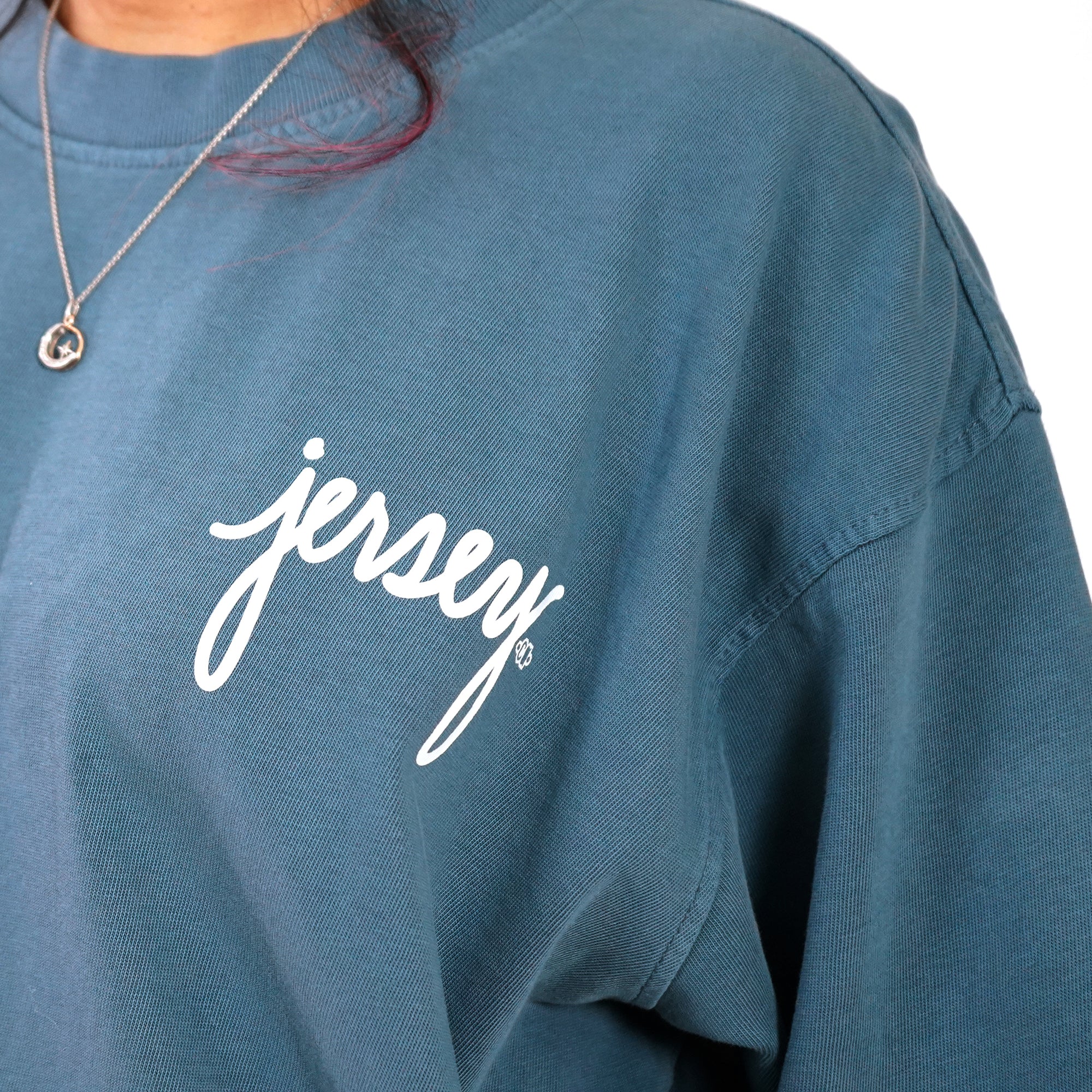 closeup of contant avenue blue jersey signature graphic t-shirt