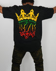 back view of guy wearing wakefield district 876 crown jamaica t-shirt