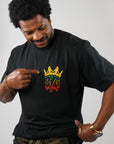 front view of guy wearing wakefield district 876 crown jamaica t-shirt