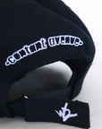 Back of black cap with adjustable Velcro strap and Contant Avenue embroidery
