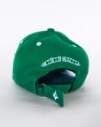 Back of green cap with adjustable Velcro strap and Contant Avenue embroidery