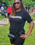 woman wearing Wakefield District black Kingston jamaica parish t-shirt
