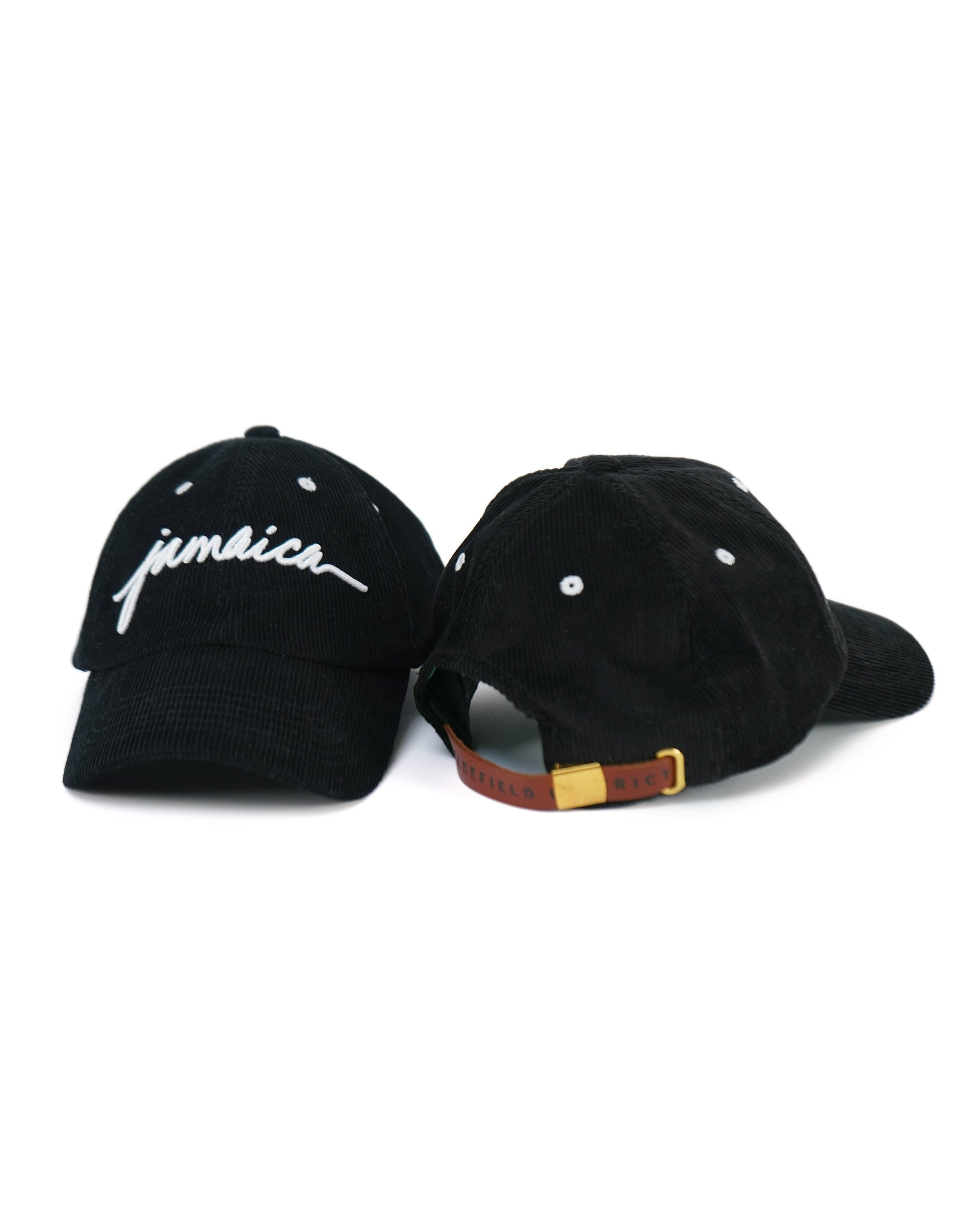 Front and back view of Wakefield District Jamaica Signature Cord Hat in black.