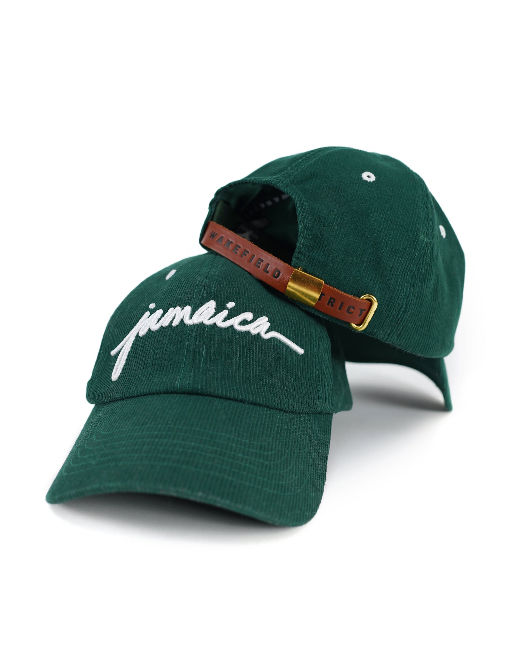 Front and back view of Wakefield District Jamaica Signature Cord Hat in Jasper green.