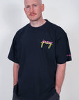 man wearing contant avenue black and sunset jersey signature graphic t-shirt