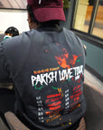 back view of man wearing black Wakefield District Jamaica parish t-shirt