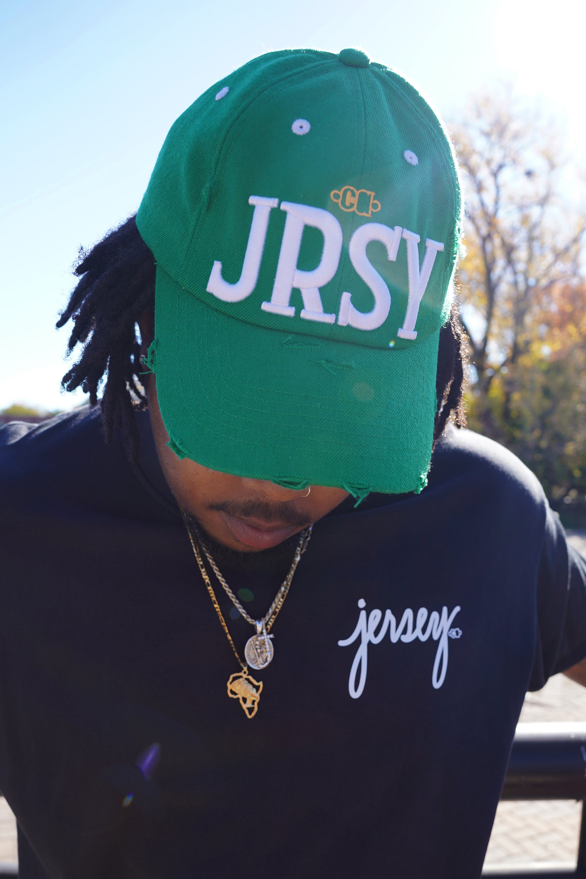 man wearing Wakefield District Contant Avenue JRSY Block Hat in green