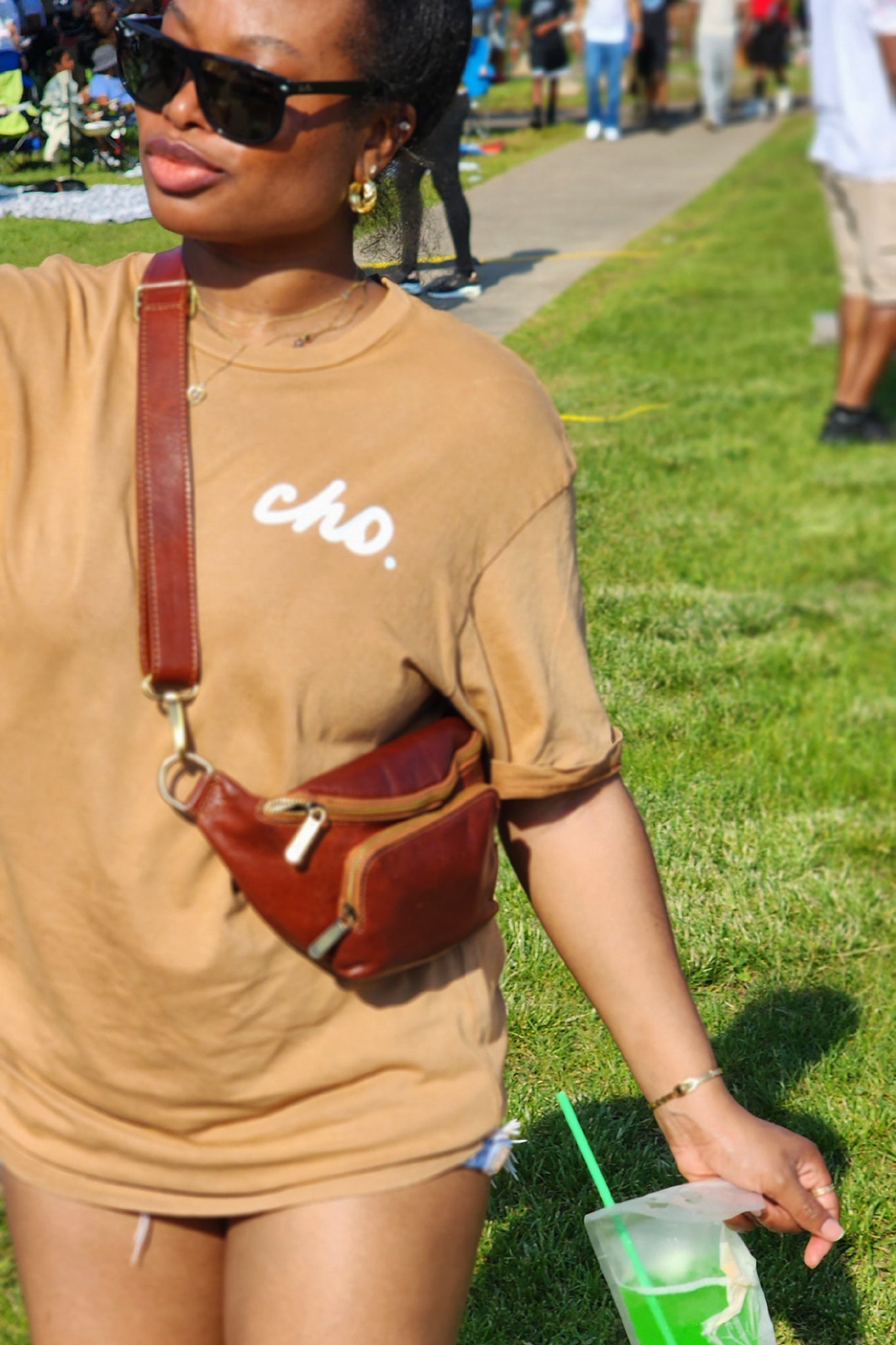 closeup of woman in park wearing Wakefield District Jamaican cho vintage tamarind t-shirt